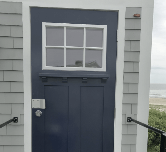 Beautiful Luxury Restroom Trailer door in Cape Cod.